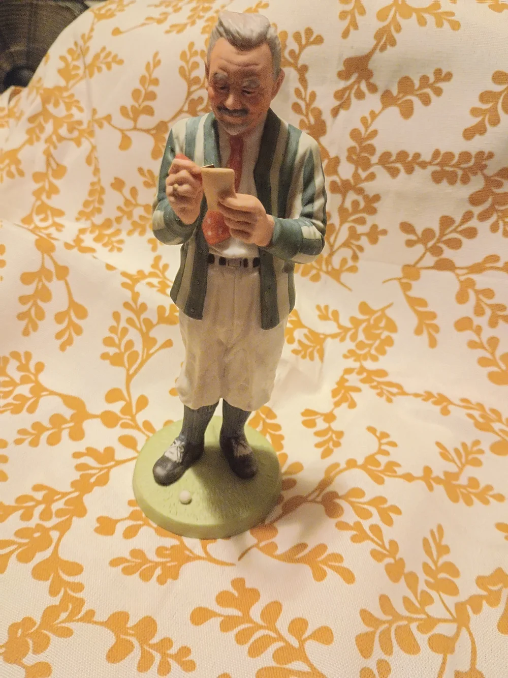 Norman Rockwell Ceramic Figurine in Cream and Green